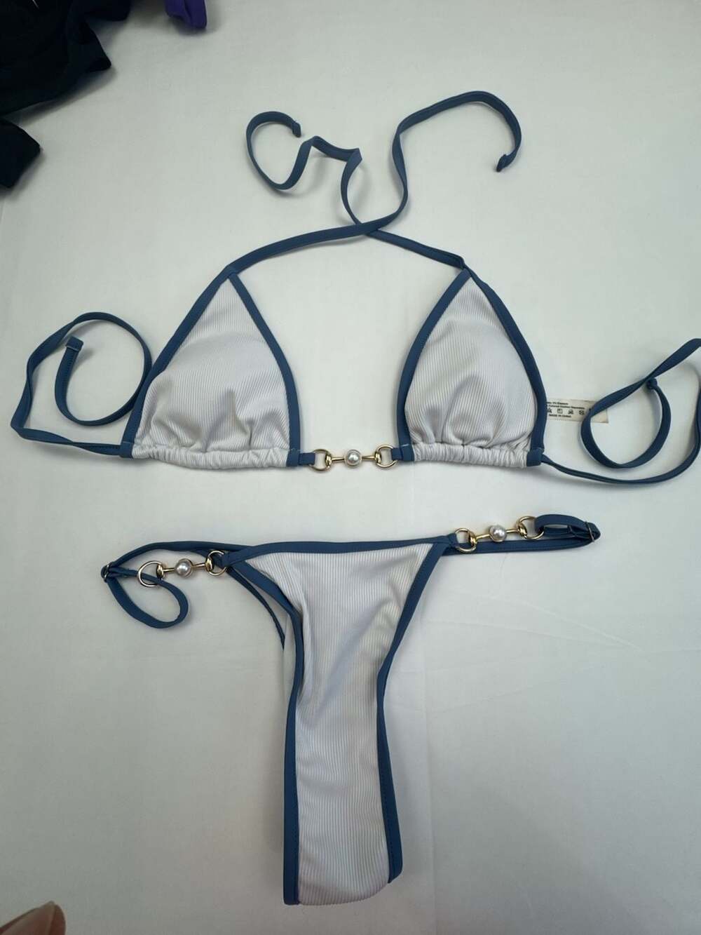 White Ribbed Triangle Bikini Set with Blue Trim and Pearl Chain Accents